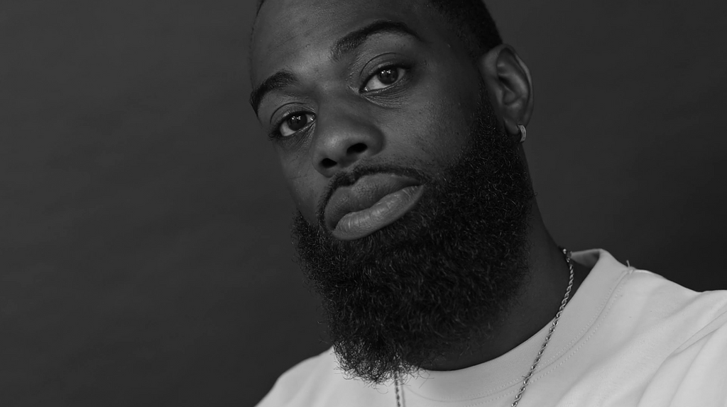 Close-up of a soft, healthy beard after using The Beard botanical beard oil