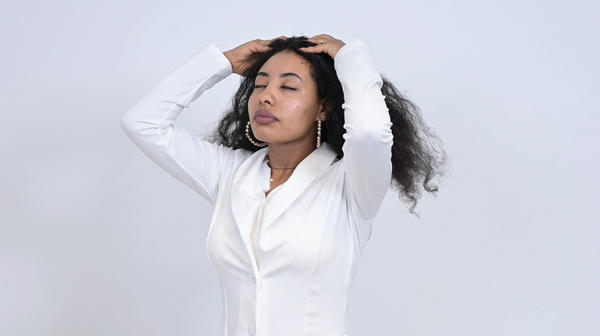 Woman with healthy hair after using The Detox scalp treatment